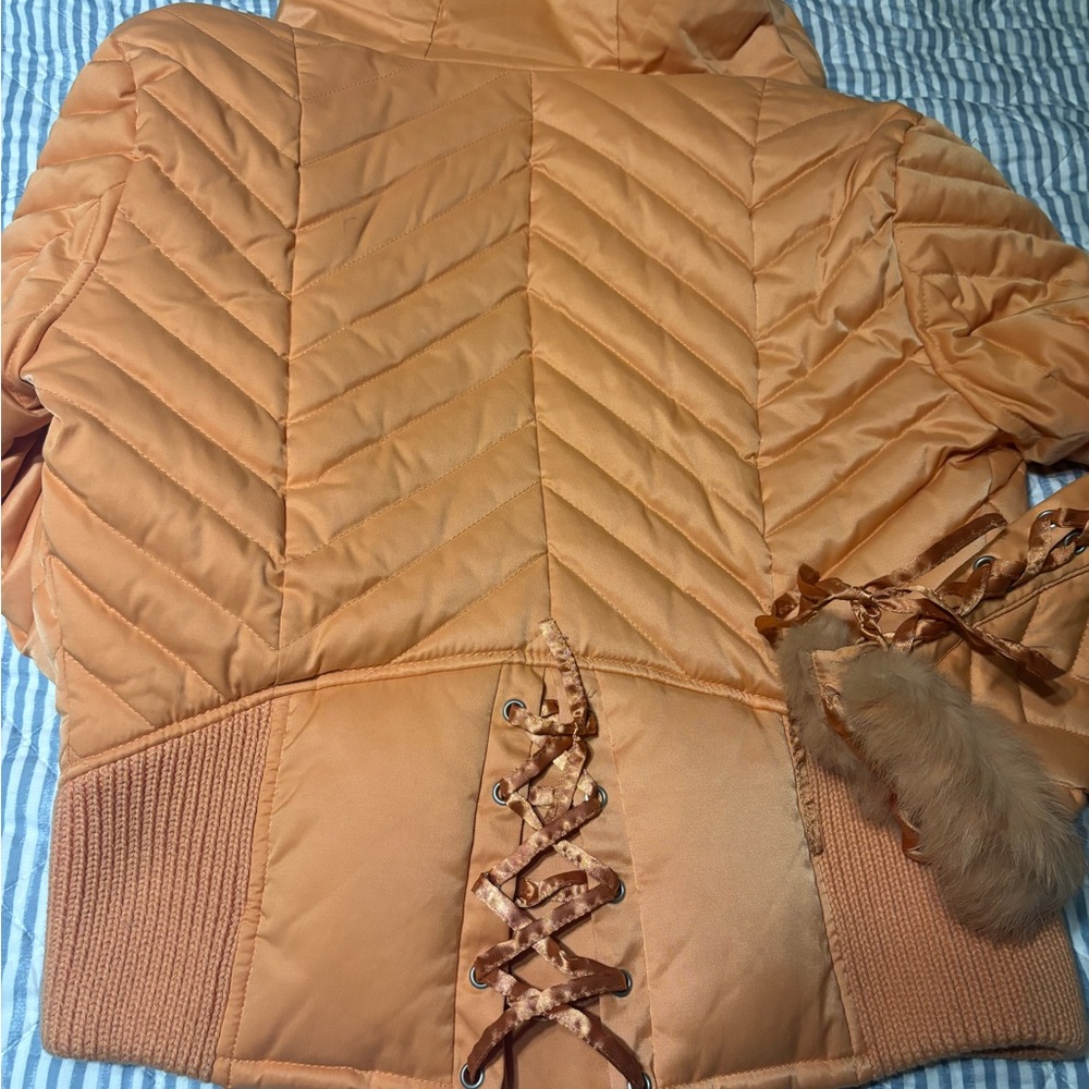 Orange Quilted Puffer Jacket with Chevron Pattern